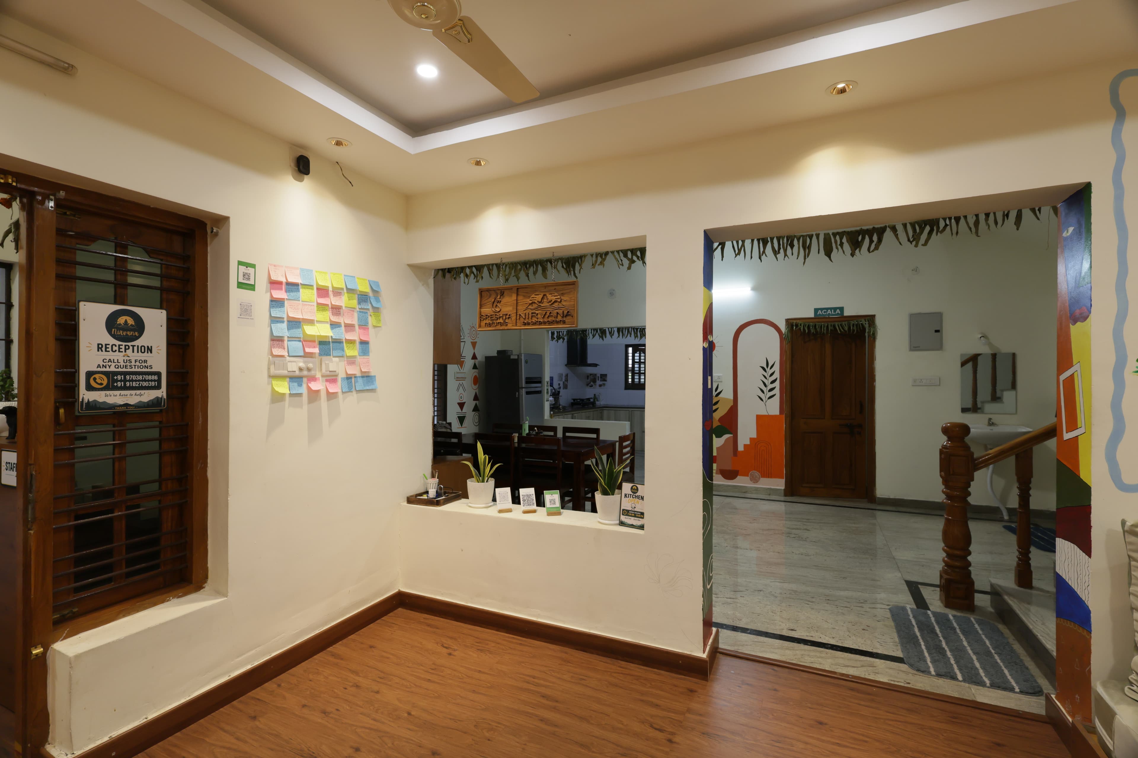Entrance hall with the notice board and doorway to the lounge