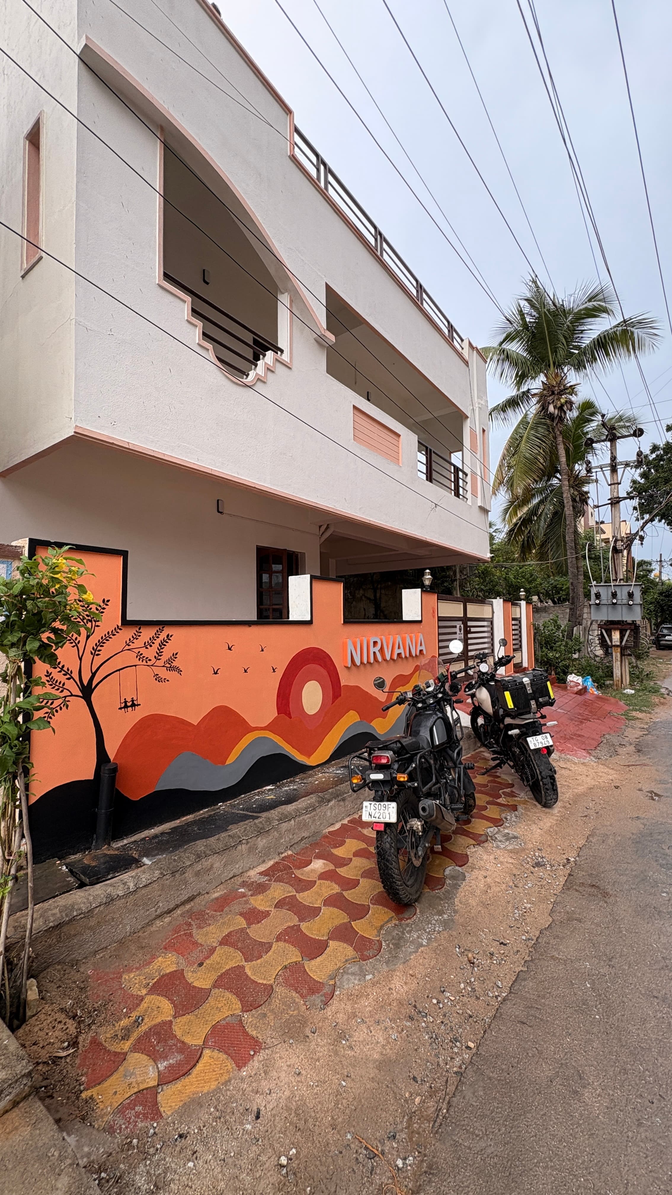 Nirvana Backpackers building and painted entrance wall